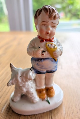 Figurine small boy eating - boy,